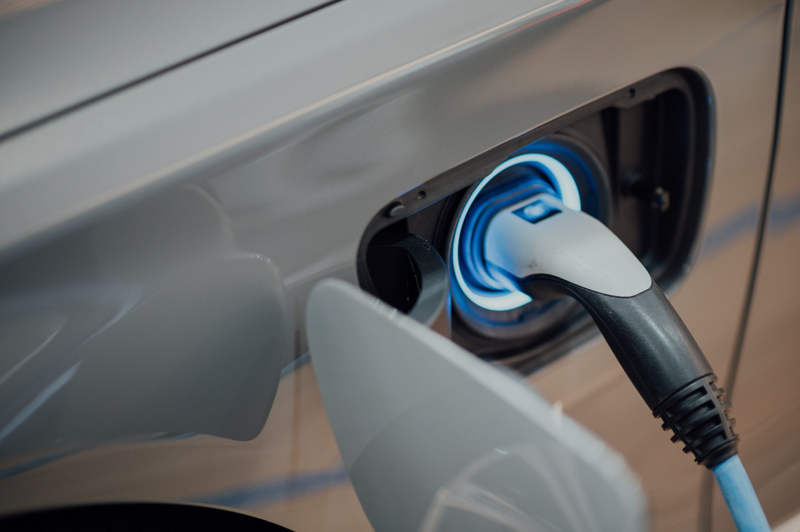 Image of plug charing an eletric car